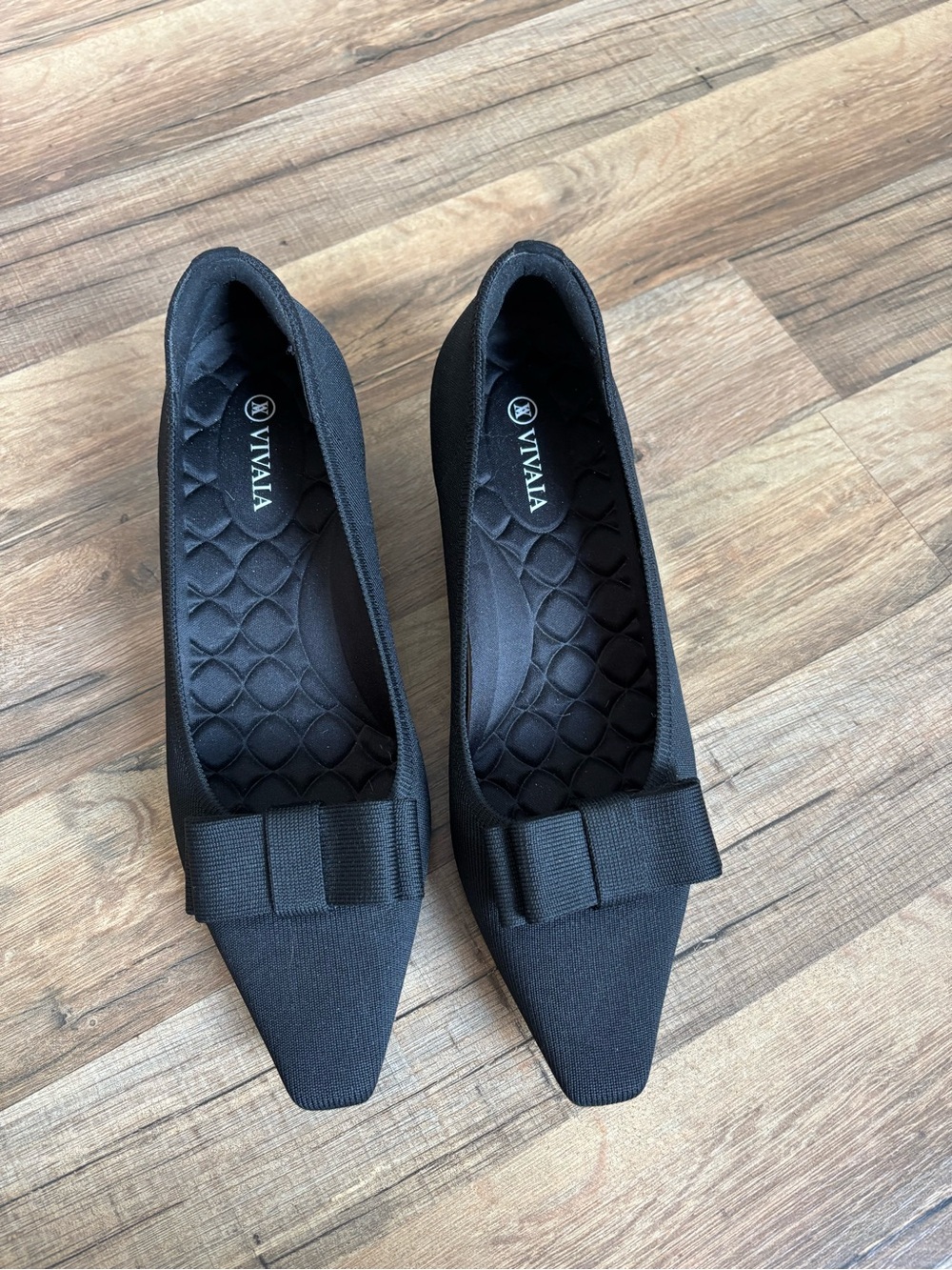 VIVAIA Black Pointed Ballet Heels with Bow Accent